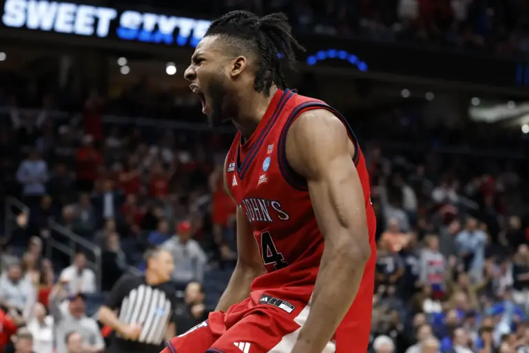 Mar 27, 2026; Washington, DC, USA; St. John's Red Storm forward Zuby Ejiofor (24) reacts after a dunk against the Duke Blue Devils in the second half during a Sweet Sixteen game of the East Regional of the men's 2026 NCAA Tournament at Capital One Arena. Mandatory Credit: Amber Searls-Imagn Images
