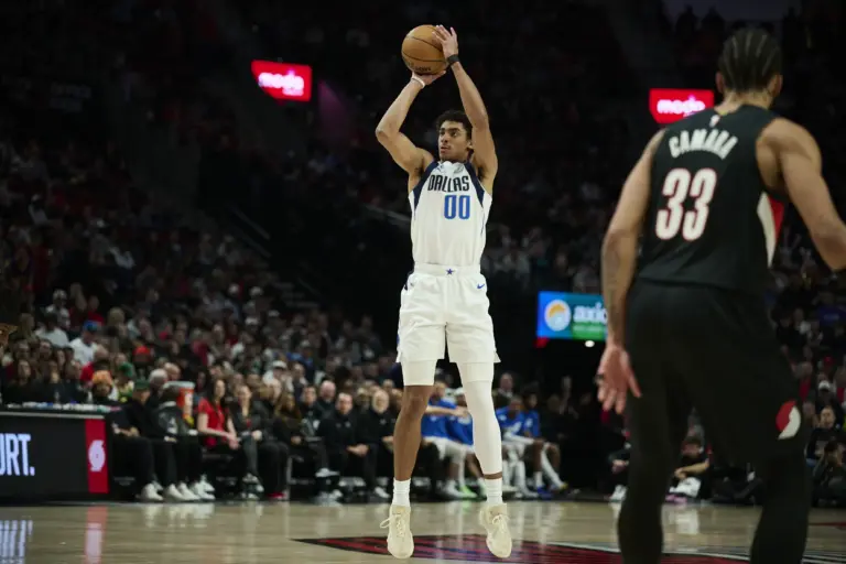 Mar 27, 2026; Portland, Oregon, USA; Dallas Mavericks guard Max Christie (00) shoots a jump shot during the second half against the Portland Trail Blazers at Moda Center. Mandatory Credit: Troy Wayrynen-Imagn Images