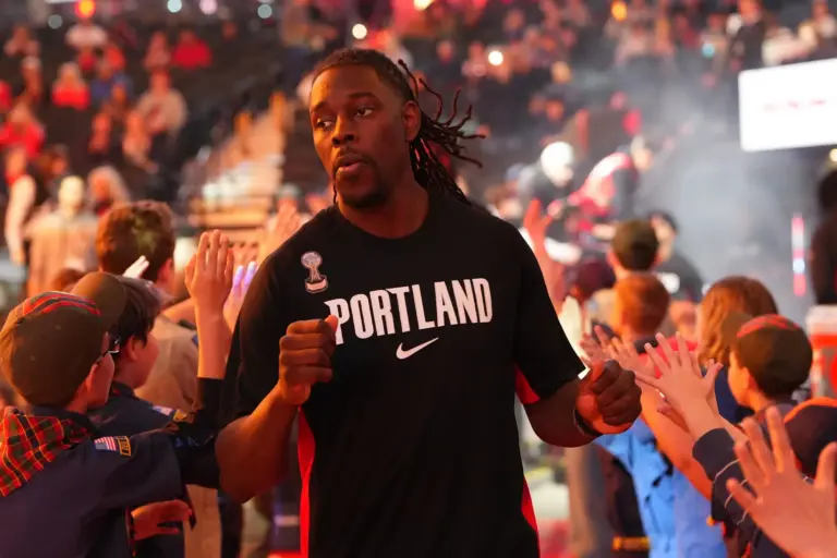 Mar 29, 2026; Portland, Oregon, USA; Portland Trail Blazers guard Jrue Holiday (5) greets fans as he walks toward the court or locker room before the game against the Washington Wizards at Moda Center. Mandatory Credit: Soobum Im-Imagn Images