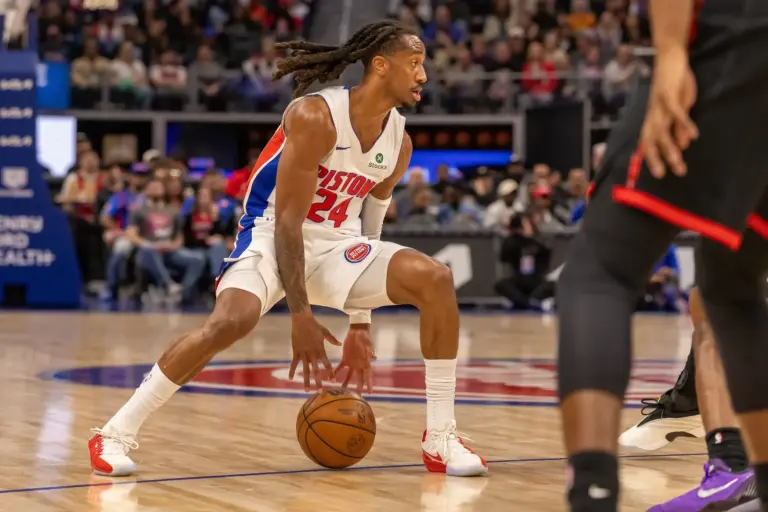 Mar 31, 2026; Detroit, Michigan, USA; Detroit Pistons Daniss Jenkins (24) moves the ball up court against the Toronto Raptors during the first quarter at Little Caesars Arena. Mandatory Credit: David Reginek-Imagn Images