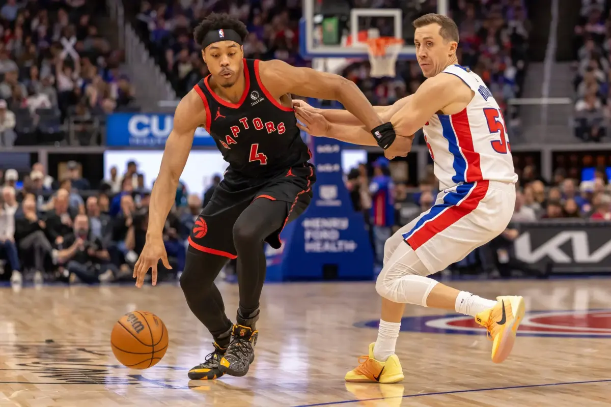 Toronto Raptors Scottie Barnes (4) moves the ball up court past Detroit Pistons Duncan Robinson (55) during the second half at Little Caesars Arena.