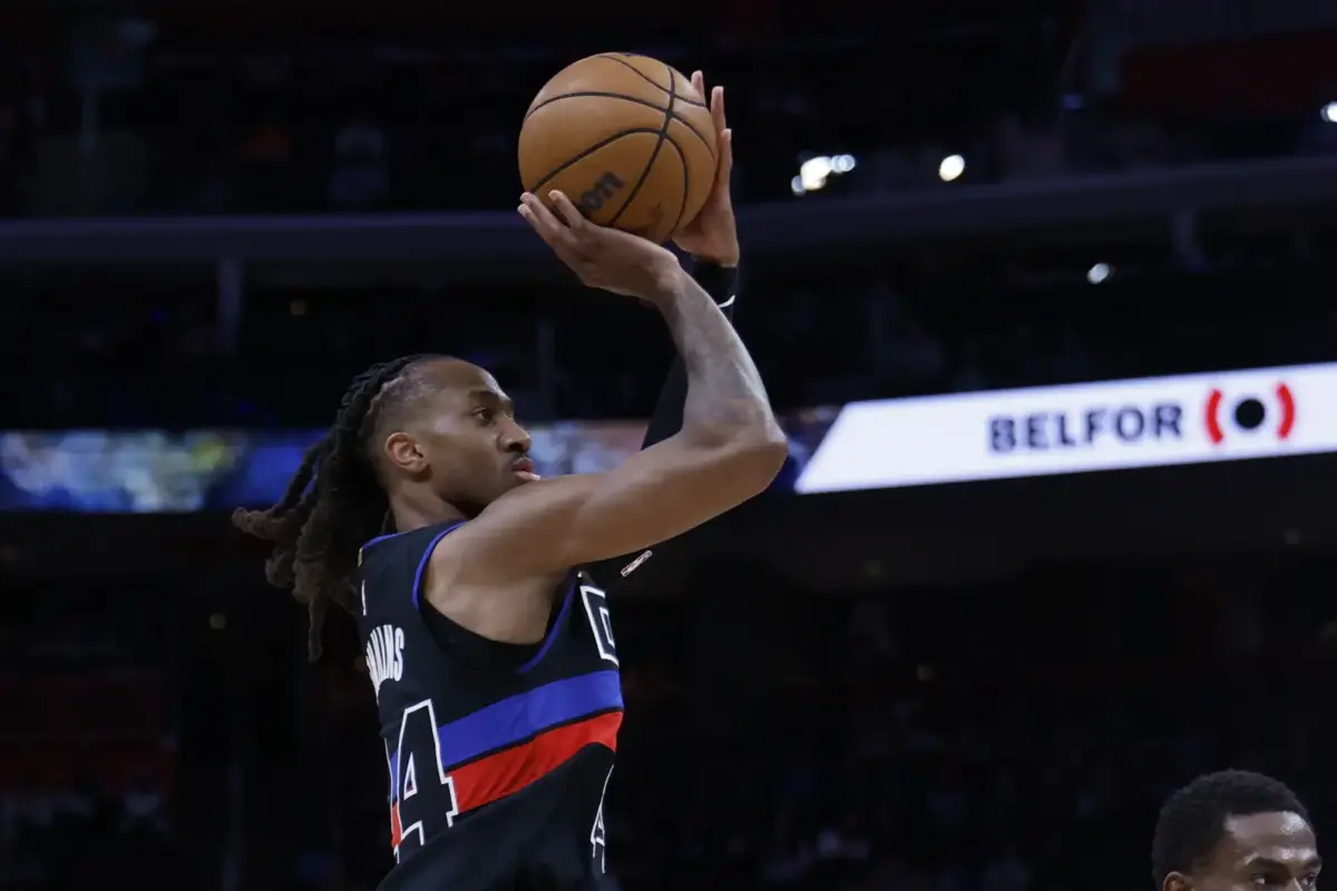 Apr 02, 2026; Detroit, MI, USA; Detroit Pistons guard Daniss Jenkins (24) shoots in the first half against the Minnesota Timberwolves at Little Caesars Arena. Mandatory Credit: Rick Osentoski-Imagn Images