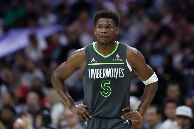 Minnesota Timberwolves guard Anthony Edwards (5) looks on during the first quarter against the Philadelphia 76ers at Xfinity Mobile Arena.
