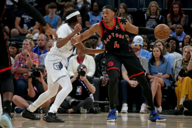 Apr 3, 2026; Memphis, Tennessee, USA; Toronto Raptors forward Scottie Barnes (4) handles the ball as Memphis Grizzlies guard Adama Bal (72) defends during the first quarter at FedExForum. Mandatory Credit: Petre Thomas-Imagn Images