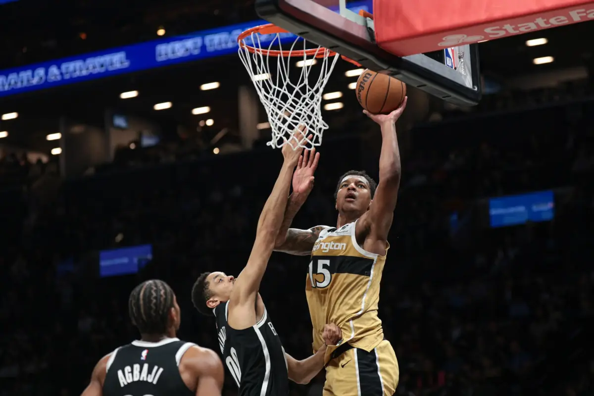 Washington Wizards forward Julian Reese (15) goes to the basket against Brooklyn Nets forward Josh Minott (00) during the first half at Barclays Center.