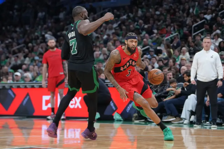 Apr 5, 2026; Boston, Massachusetts, USA; Toronto Raptors forward Brandon Ingram (3) dribbles the ball against Boston Celtics guard Jaylen Brown (7) during the second half at TD Garden. Mandatory Credit: Gregory Fisher-Imagn Images