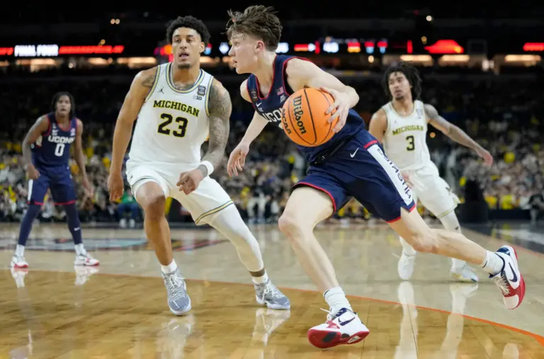 UConn Huskies guard Braylon Mullins (24) drives to the basket Monday, April 6, 2026, against the Michigan Wolverines during the NCAA men's basketball tournament national championship game at Lucas Oil Stadium in Indianapolis.