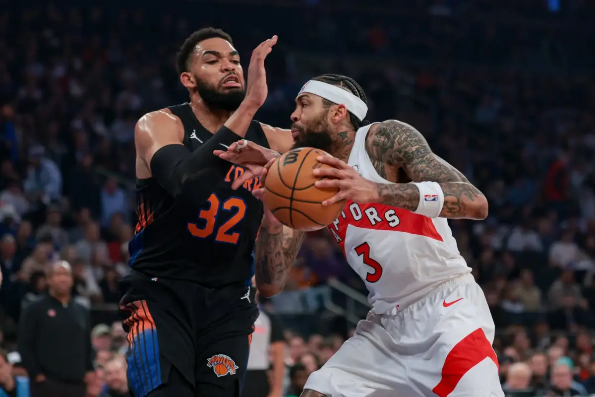 Toronto Raptors forward Brandon Ingram (3) drives to the basket against New York Knicks center Karl-Anthony Towns (32) during the first quarter at Madison Square Garden.