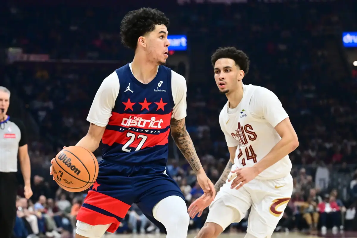Washington Wizards guard Will Riley (27) drives to the basket against Cleveland Cavaliers guard Tyrese Proctor (24) during the second half at Rocket Arena.