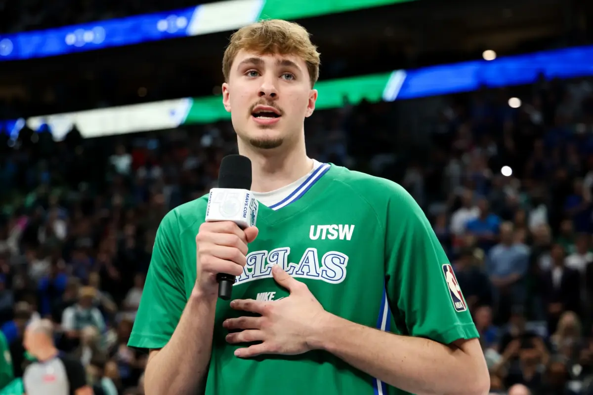 Dallas Mavericks forward Cooper Flagg (32) speaks to the crowd before the game against the Chicago Bulls at American Airlines Center.