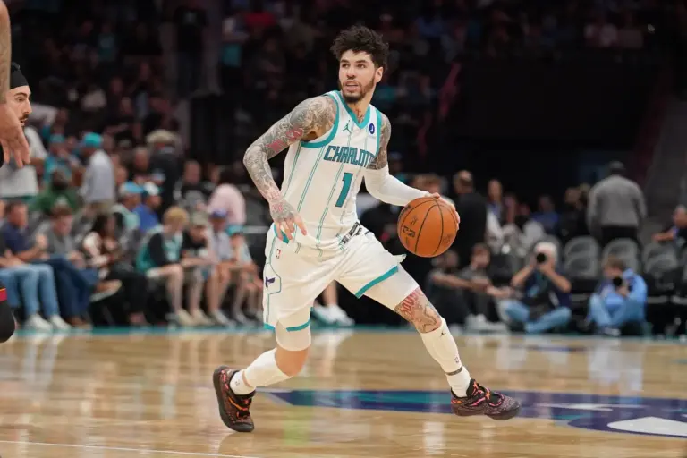 Charlotte Hornets point guard LaMelo Ball dribbles down the court