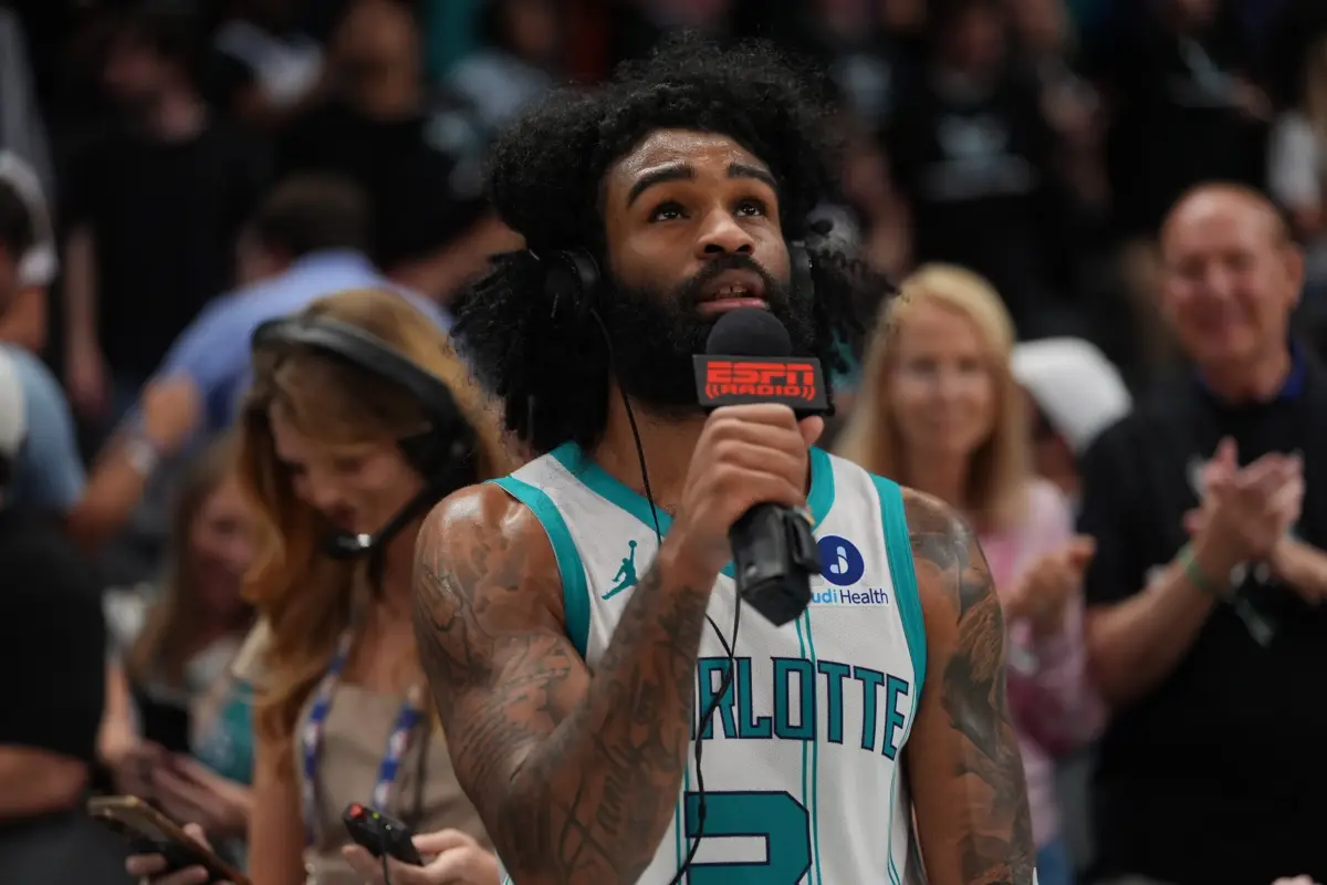 Charlotte Hornets guard Coby White (3) gives an interview after the overtime win during the play-in rounds between the Charlotte Hornets and the Miami Heat of the 2026 NBA Playoffs at Spectrum Center.