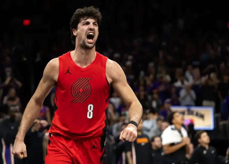 Portland Trail Blazers forward Deni Avdija (8) celebrates against the Phoenix Suns in the second half during the play-in rounds of the 2026 NBA Playoffs at Mortgage Matchup Center.