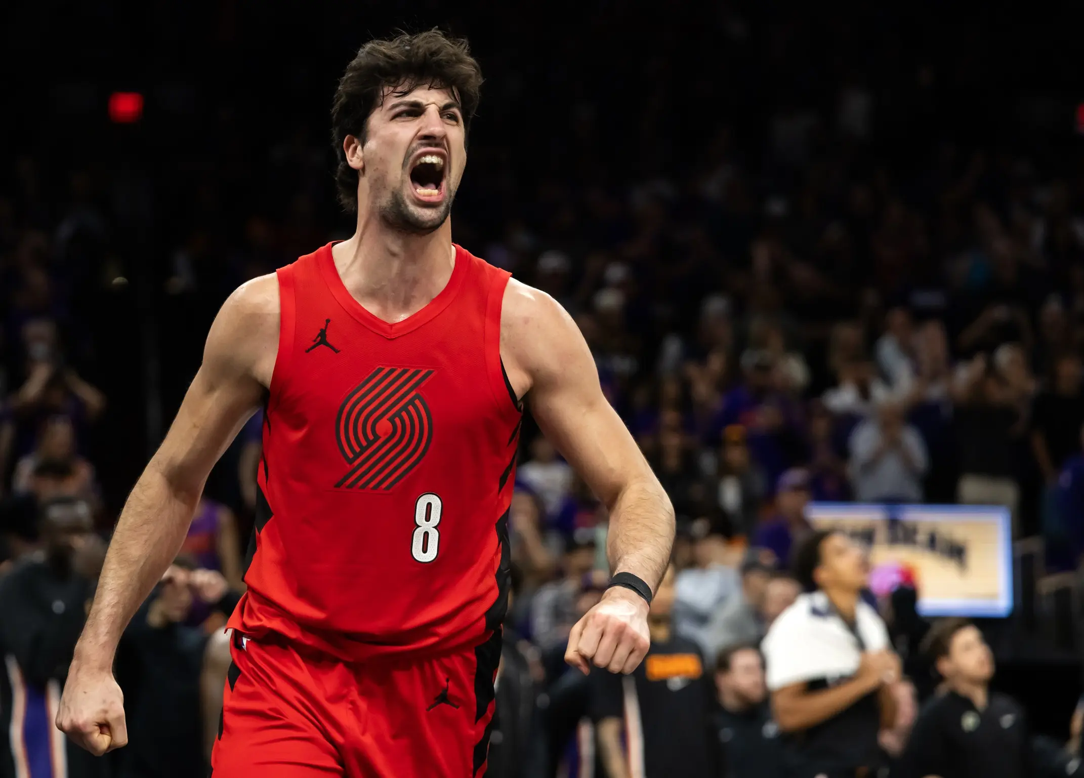 Portland Trail Blazers forward Deni Avdija (8) celebrates against the Phoenix Suns in the second half during the play-in rounds of the 2026 NBA Playoffs at Mortgage Matchup Center.