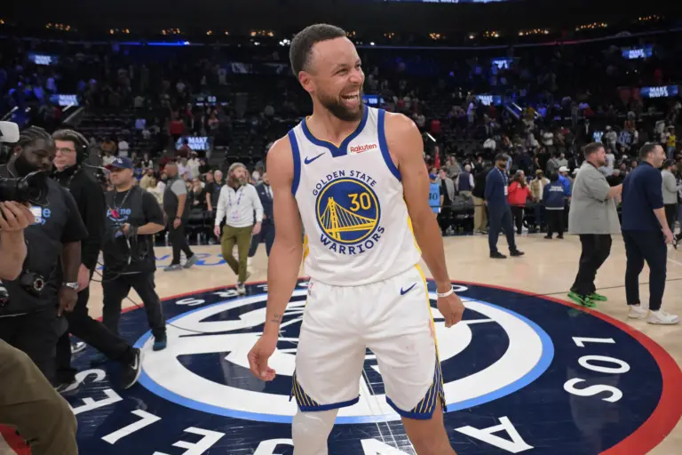 Golden State Warriors guard Stephen Curry (30) smiles on the court after defeating the Los Angeles Clippers during the play-in rounds of the 2026 NBA Playoffs at Intuit Dome.