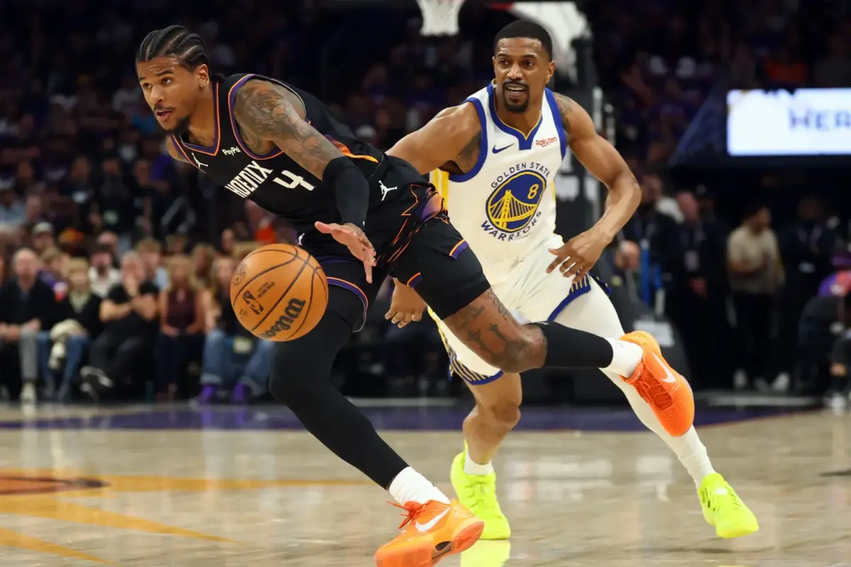 Jalen Green drives against the Golden State Warriors