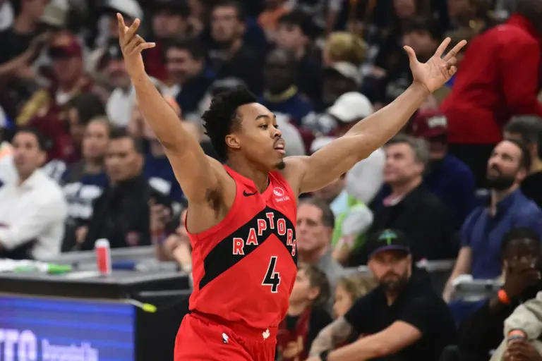 Toronto Raptors forward Scottie Barnes (4) celebrates after hitting a three point basket against the Cleveland Cavaliers during the first quarter of game one in the first round of the 2026 NBA Playoffs at Rocket Arena.