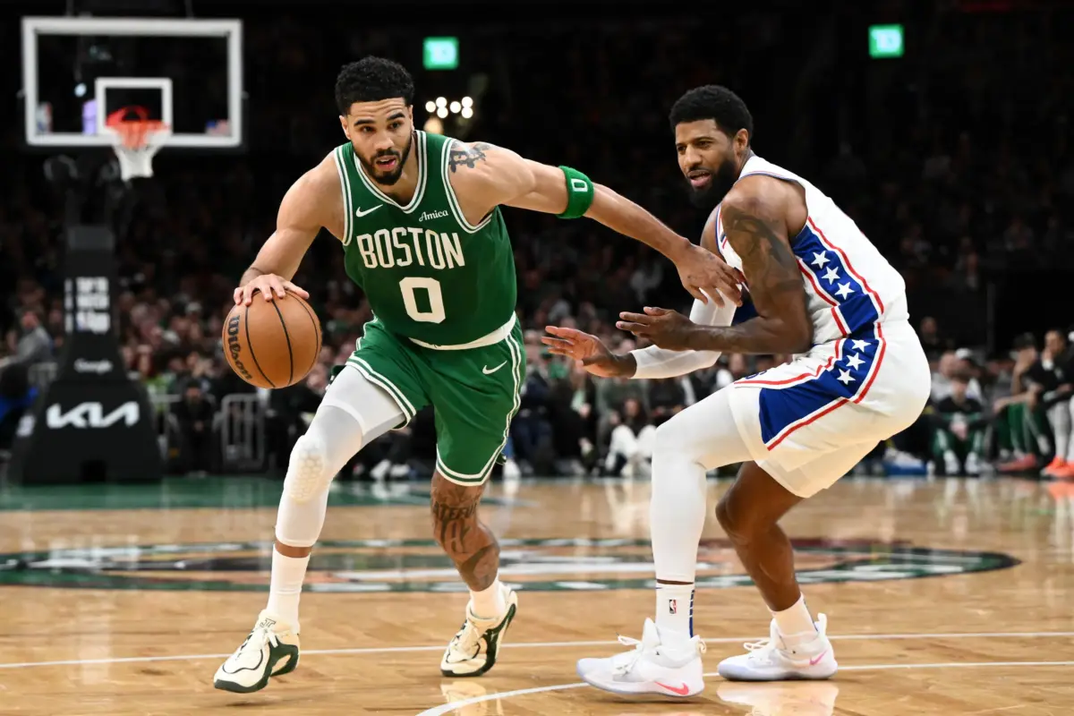 Apr 21, 2026; Boston, Massachusetts, USA; Boston Celtics forward Jayson Tatum (0) drives to the basket against the Philadelphia 76ers in the second half of a game two of the first round of the 2026 NBA Playoffs at TD Garden. Mandatory Credit: Brian Fluharty-Imagn Images