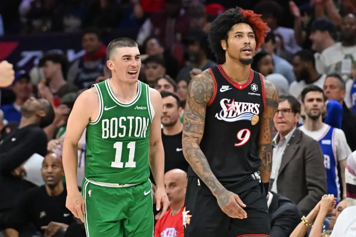 Apr 24, 2026; Philadelphia, Pennsylvania, USA; Boston Celtics guard Payton Pritchard (11) reacts after a three point basket shot against Philadelphia 76ers guard Kelly Oubre Jr. (9) during the second half at Xfinity Mobile Arena. Mandatory Credit: Eric Hartline-Imagn Images