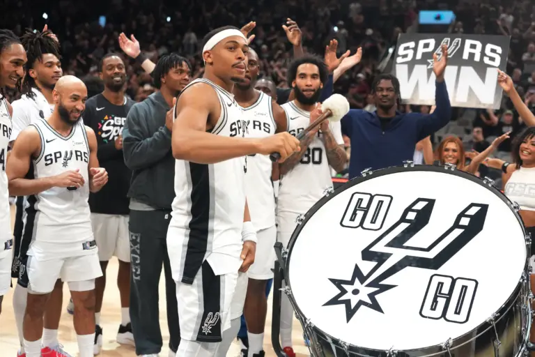 Apr 28, 2026; San Antonio, Texas, USA; San Antonio Spurs forward Keldon Johnson (3) beats the drum to celebrate along with teammates after a victory in game five of the first round of the 2026 NBA Playoffs against the Portland Trail Blazers at Frost Bank Center. Mandatory Credit: Scott Wachter-Imagn Images