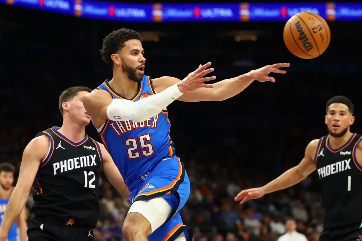 Oklahoma City Thunder guard Ajay Mitchell (25) against the Phoenix Suns during game four of the first round of the 2026 NBA Playoffs at Mortgage Matchup Center.