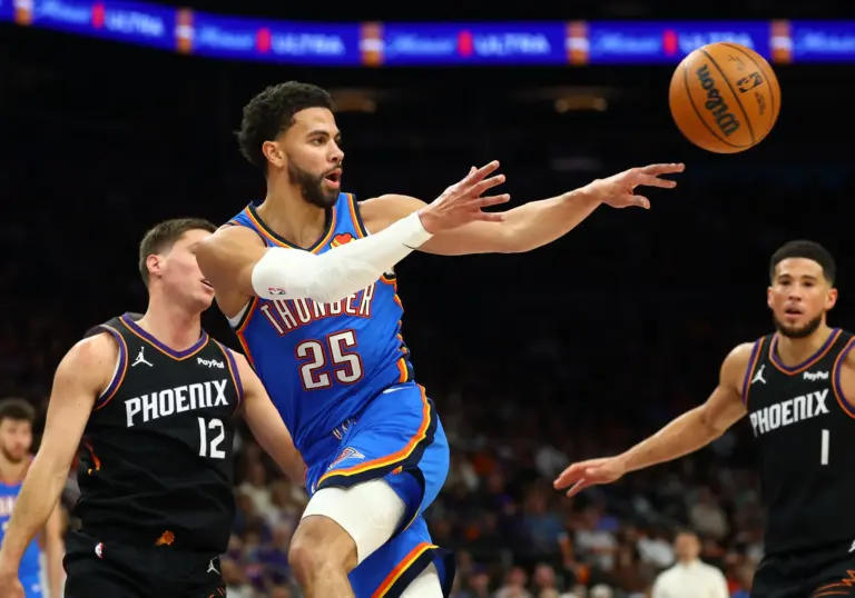 Oklahoma City Thunder guard Ajay Mitchell (25) against the Phoenix Suns during game four of the first round of the 2026 NBA Playoffs at Mortgage Matchup Center.