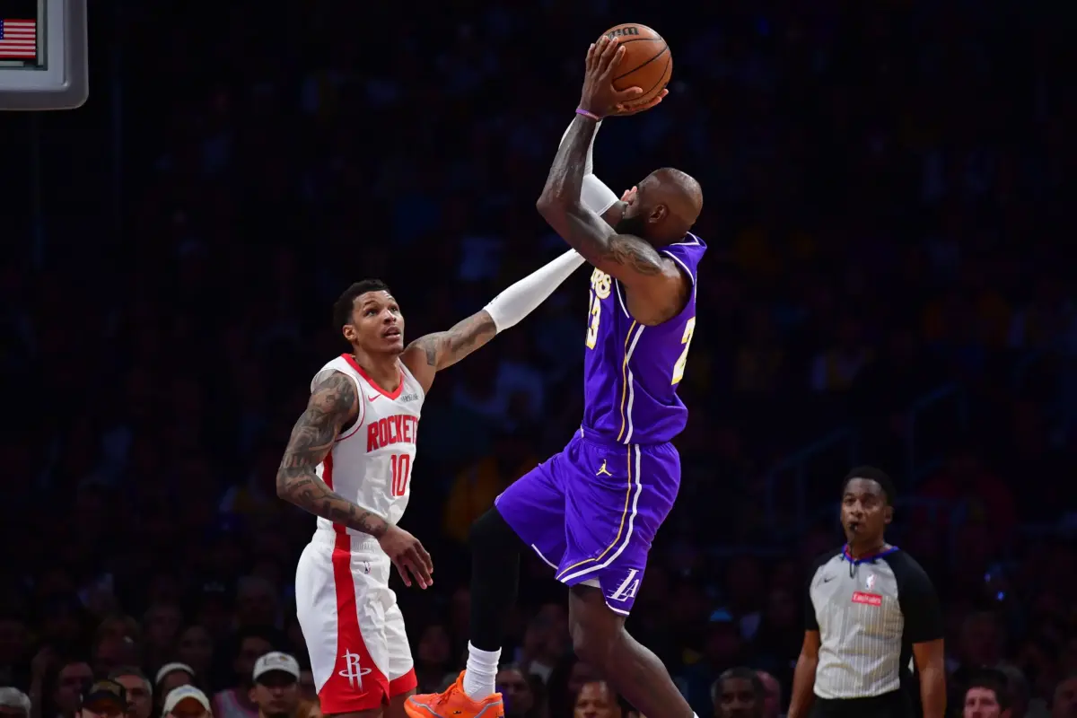 Los Angeles Lakers forward LeBron James (23) shoots against Houston Rockets forward Jabari Smith Jr. (10) during the second half in game five of the first round of the 2026 NBA Playoffs at Crypto.com Arena.