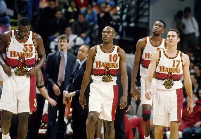 Atlanta Hawks guard Mookie Blaylock (10), Tyrone Corbin (33), Jon Barry (17) and Dikembe Mutombo (55) against the Chicago Bulls at the Omni.