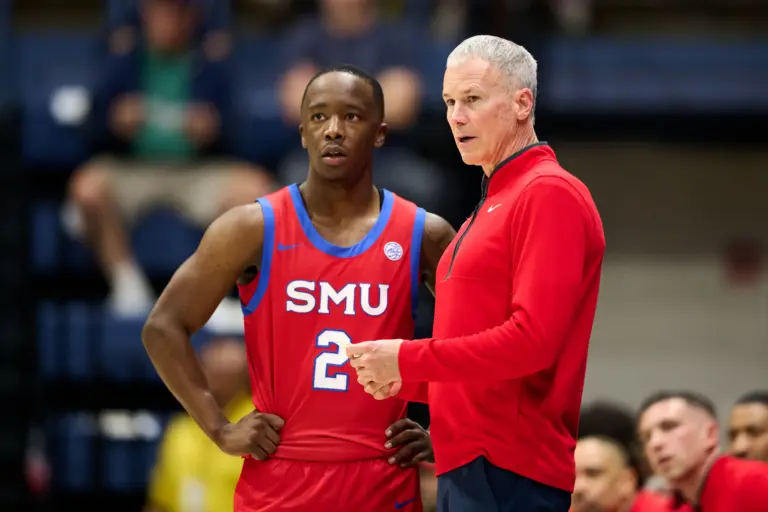 SMU Mustangs guard Boopie Miller and head coach Andy Enfield