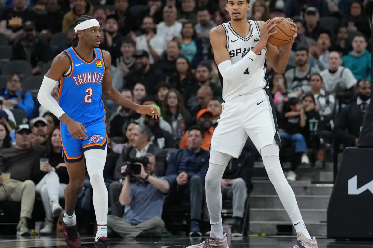 San Antonio Spurs center Victor Wembanyama (1) looks down the court beside Oklahoma City Thunder guard Shai Gilgeous-Alexander (2) in the first half at Frost Bank Center. A new chapter in the Thunder vs Spurs rivalry is right around the corner.