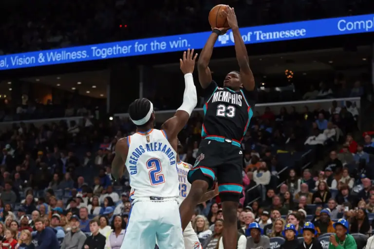 Memphis Grizzlies forward Cedric Coward (23) shoots as Oklahoma City Thunder guard Shai Gilgeous-Alexander (2) defends during the third quarter at FedExForum.