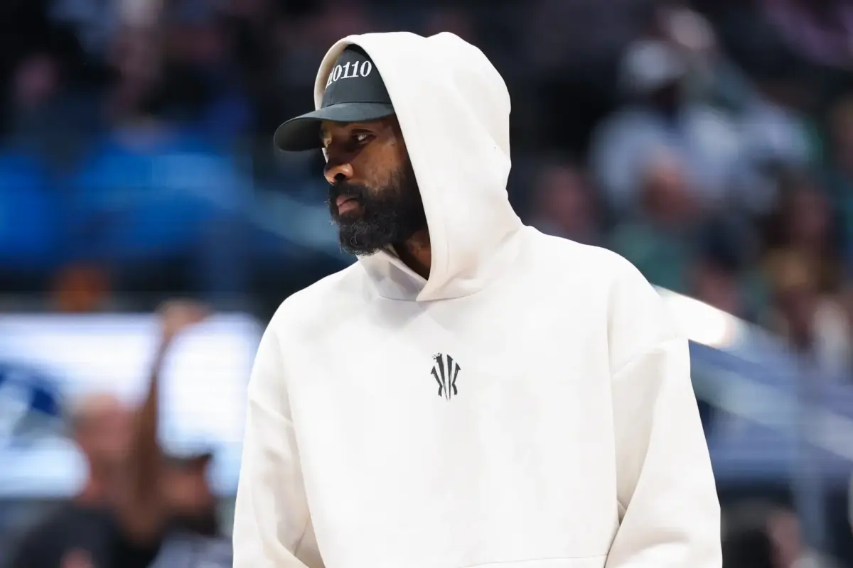 Dallas Mavericks guard Kyrie Irving looks on during the second half against the Minnesota Timberwolves at American Airlines Center.