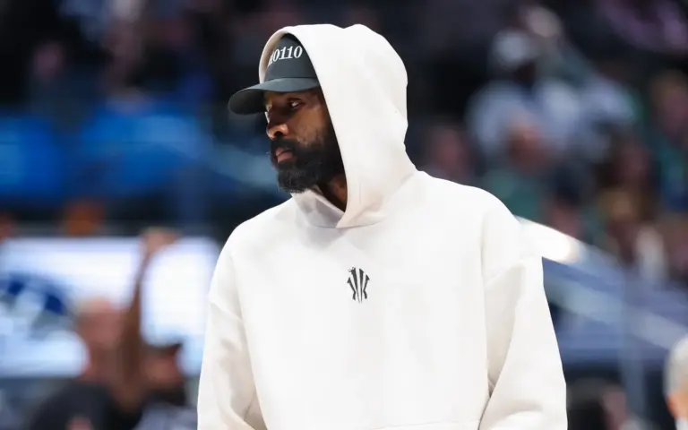 Dallas Mavericks guard Kyrie Irving looks on during the second half against the Minnesota Timberwolves at American Airlines Center.