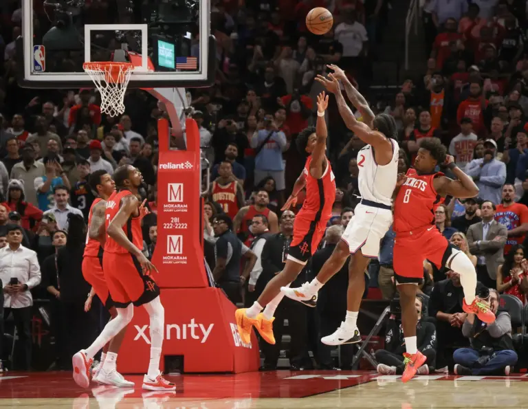 Los Angeles Clippers star Kawhi Leonard takes a midrange jumper between four Houston Rockets defenders