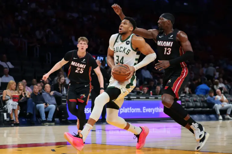 Milwaukee Bucks forward Giannis Antetokounmpo (34) drives to the basket against Miami Heat center Bam Adebayo (13) during the first quarter at Kaseya Center.