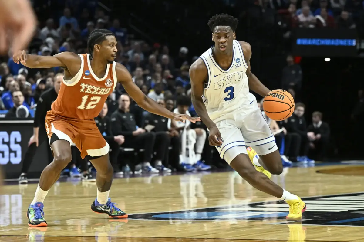 BYU Cougars forward AJ Dybantsa (3) drives against Texas Longhorns guard Tramon Mark (12) in the first half during a first round game of the men's 2026 NCAA Tournament at Moda Center. He is in the No. 1 overall pick discussions.