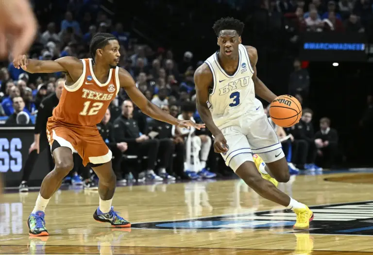 BYU Cougars forward AJ Dybantsa (3) drives against Texas Longhorns guard Tramon Mark (12) in the first half during a first round game of the men's 2026 NCAA Tournament at Moda Center. He is in the No. 1 overall pick discussions.