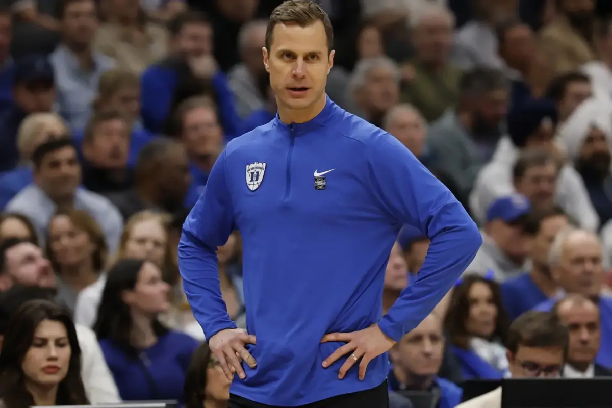 Duke Blue Devils head coach Jon Scheyer looks on against the UConn Huskies in the first half during an Elite Eight game of the East Regional of the men's 2026 NCAA Tournament at Capital One Arena.