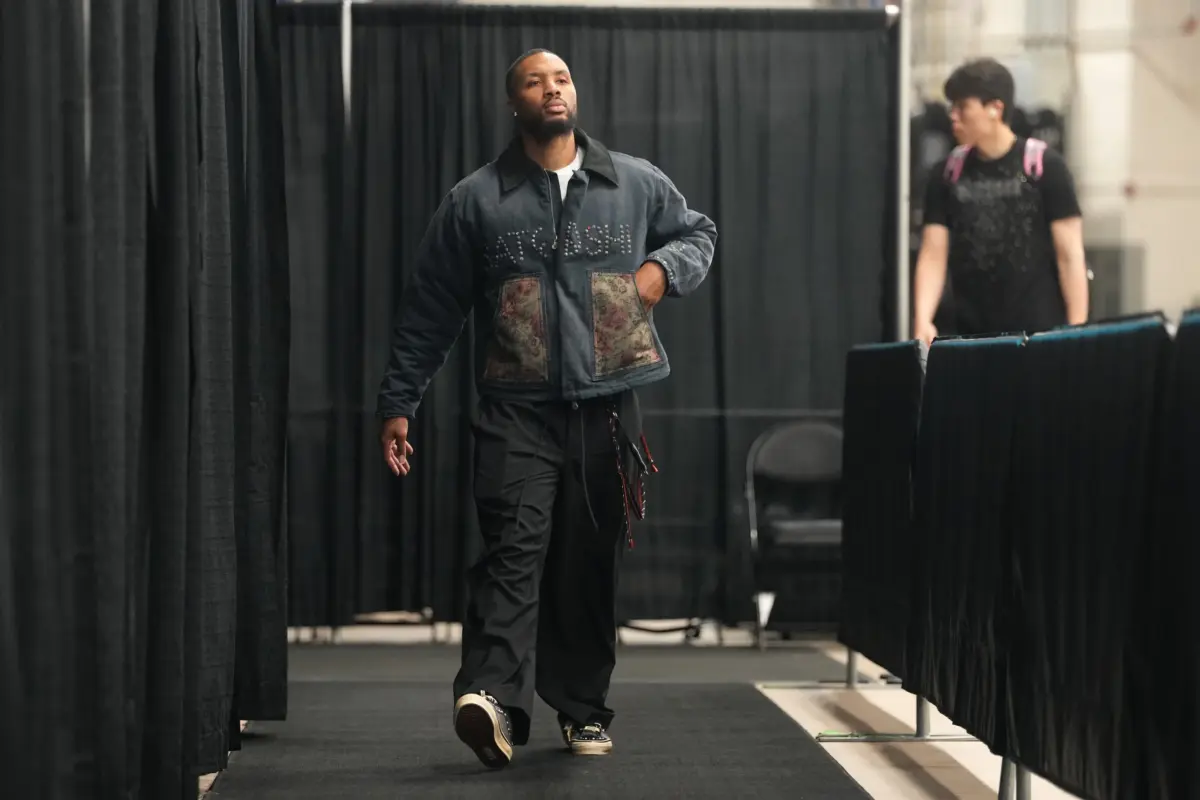 Portland Trail Blazers guard Damian Lillard (0) enters Frost Bank Center before game two of the first round of the 2026 NBA Playoffs. Lillard can be a big factor in the Blazers' offseason plans.