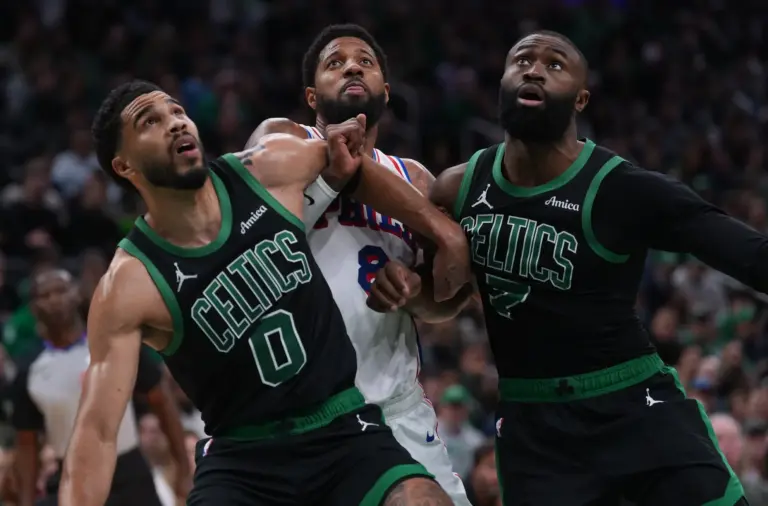 Boston Celtics stars Jayson Tatum and Jaylen Brown box out Philadelphia 76ers star Paul George