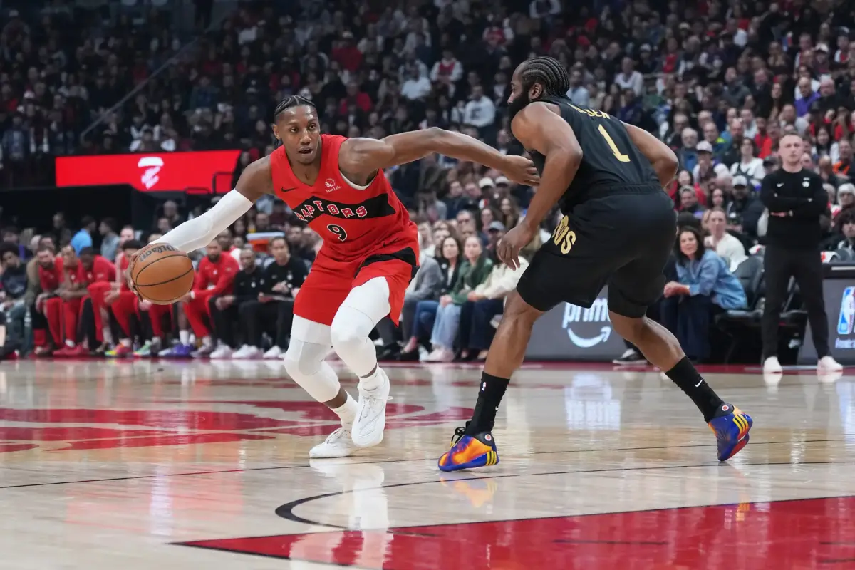 May 1, 2026; Toronto, Ontario, CAN; Toronto Raptors forward RJ Barrett (9) controls the ball as Cleveland Cavaliers guard James Harden (1) tries to defend during the first quarter in game six of the first round of the 2026 NBA Playoffs at Scotiabank Arena. Mandatory Credit: Nick Turchiaro-Imagn Images