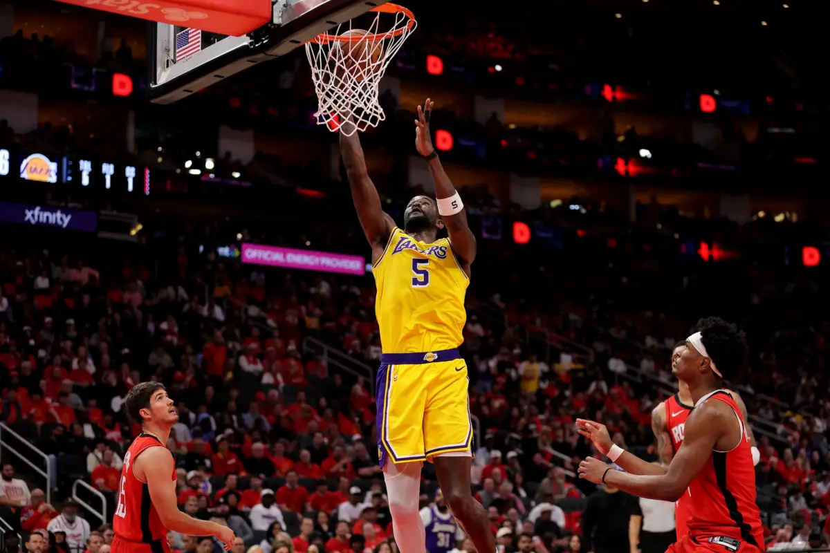 May 1, 2026; Houston, Texas, USA; Los Angeles Lakers center Deandre Ayton (5) shoots against the Houston Rockets during the third quarter of game six of the first round of the 2026 NBA Playoffs at Toyota Center. Mandatory Credit: Erik Williams-Imagn Images