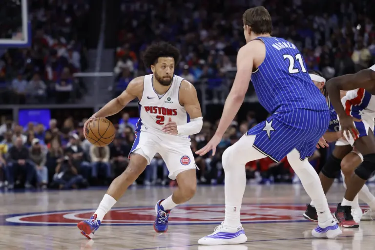 Detroit Pistons guard Cade Cunningham (2) dribbles defended by Orlando Magic forward Moritz Wagner (21) in the second half during game seven of the first round of the 2026 NBA Playoffs at Little Caesars Arena.