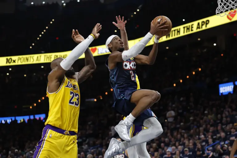 Los Angeles Lakers forward LeBron James goes up for a block against Oklahoma City Thunder guard Shai Gilgeous-Alexander