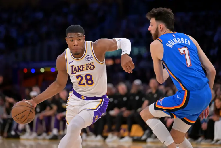 May 9, 2026; Los Angeles, California, USA; Los Angeles Lakers forward Rui Hachimura (28) is defended by Oklahoma City Thunder center Chet Holmgren (7) during the first quarter of game three of the second round of the 2026 NBA Playoffs at Crypto.com Arena. Mandatory Credit: Jayne Kamin-Oncea-Imagn Images