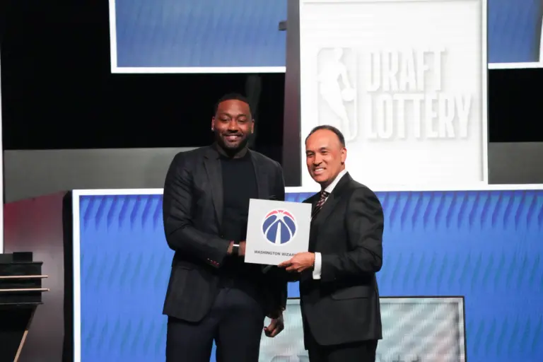 Mark Tatum the NBA Deputy Commissioner and Washington Wizards (left) guard John Wall pose for photos after Wizards won the 2026 NBA Draft Lottery at Navy Pier.