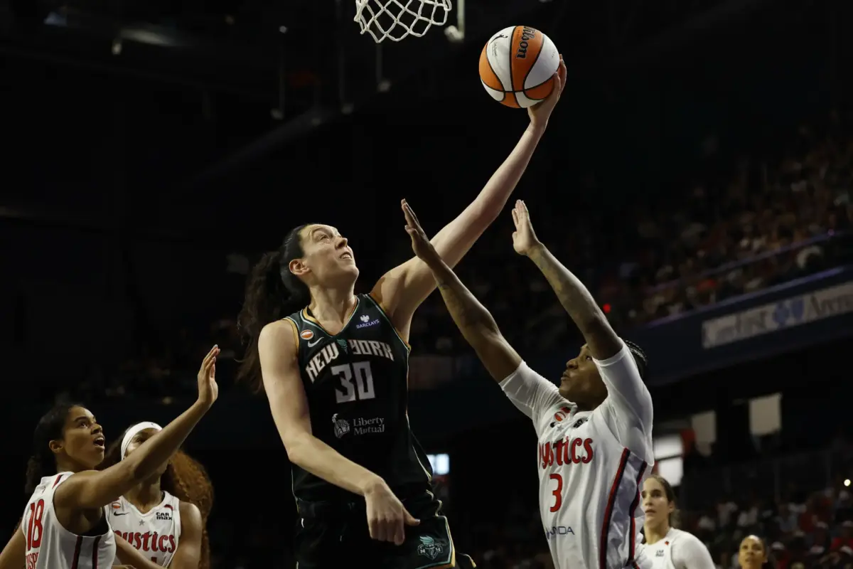 May 10, 2026; Washington, District of Columbia, USA; New York Liberty forward Breanna Stewart (30) shoots the ball as Washington Mystics guard Rori Harmon (3) defends in the second half at CareFirst Arena. This way played during the 2026 WNBA Opening Weekend.