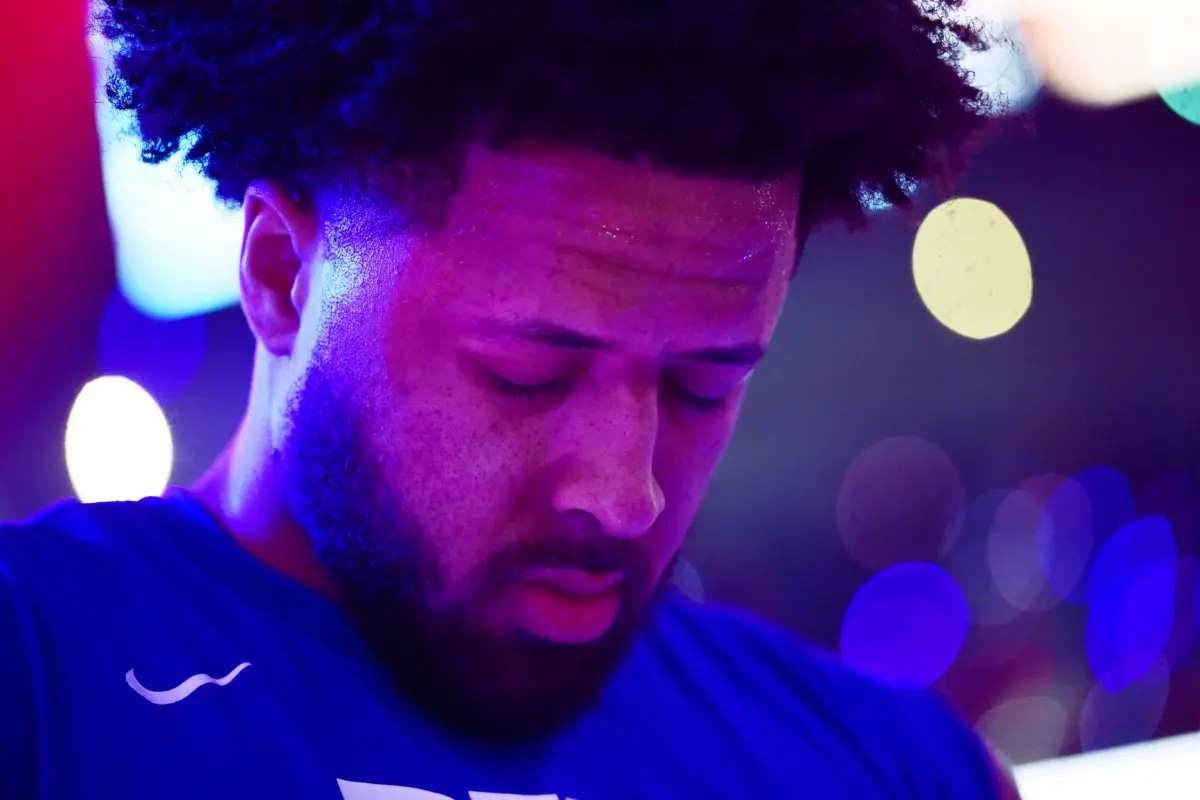 Detroit Pistons guard Cade Cunningham (2) listens to the national anthem before game six between the Cleveland Cavaliers and the Pistons in the second round of the 2026 NBA Playoffs at Rocket Arena.