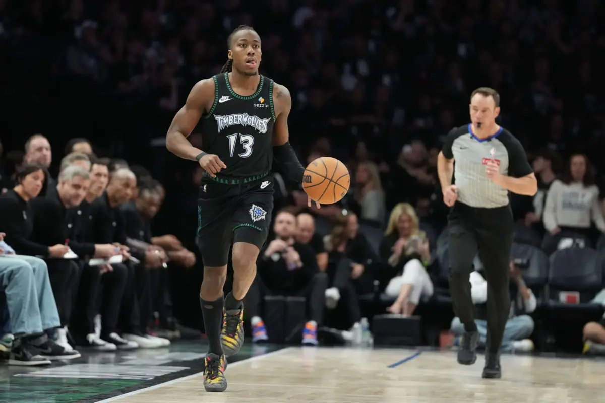 Minnesota Timberwolves guard Ayo Dosunmu (13) dribbles the ball against the San Antonio Spurs in the second during game six of the second round of the 2026 NBA Playoffs at Target Center.