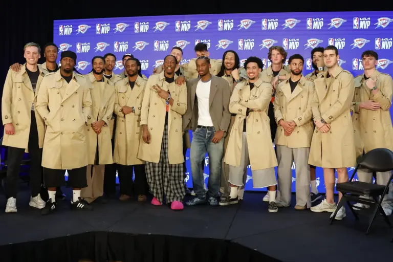 Oklahoma City Thunder guard Shai Gilgeous-Alexander stands with his teammates for a photo after a press conference announcing he won the 2025-2026 NBA Most Valuable Player award. A Thunder vs Spurs showdown is on the horizon for Gilgeous-Alexander and his team.